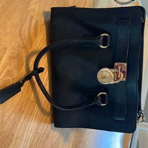 Genuine Michael Kors bag. Black with gold
